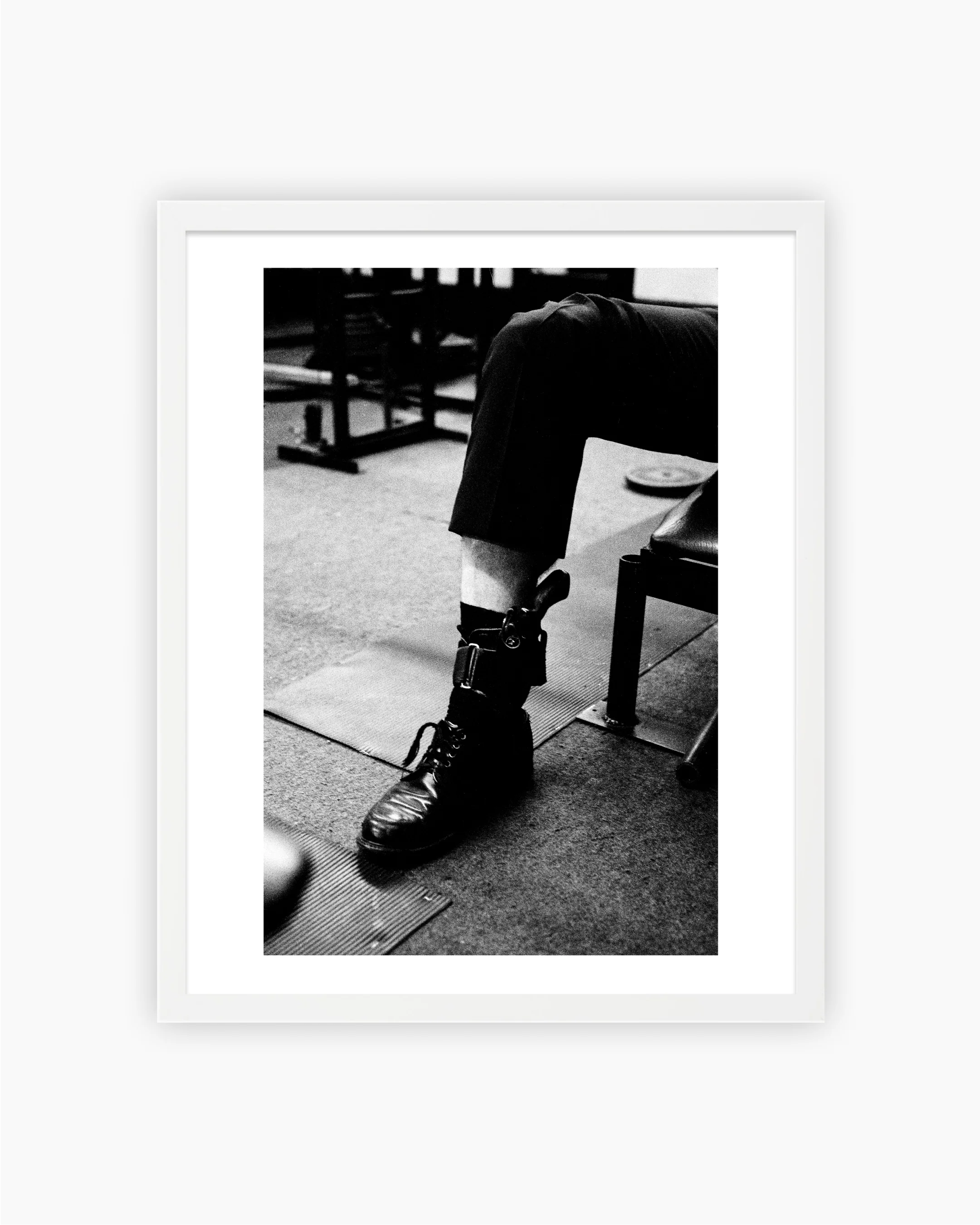 Magnum Editions: An officer removes his ankle revolver, New York City, 1979 - Image 3